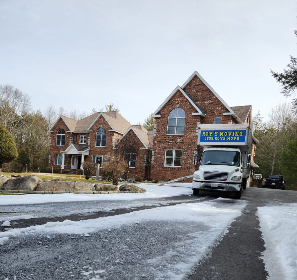 Moving Truck by a Home